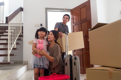 Asian family moving into a Property